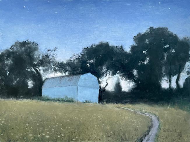 Landscape painting of a white barn at dusk in the summer. A foot path leads to the barn. The sky is a deep indigo blue and the grass in the foreground almost glows in the fading light.