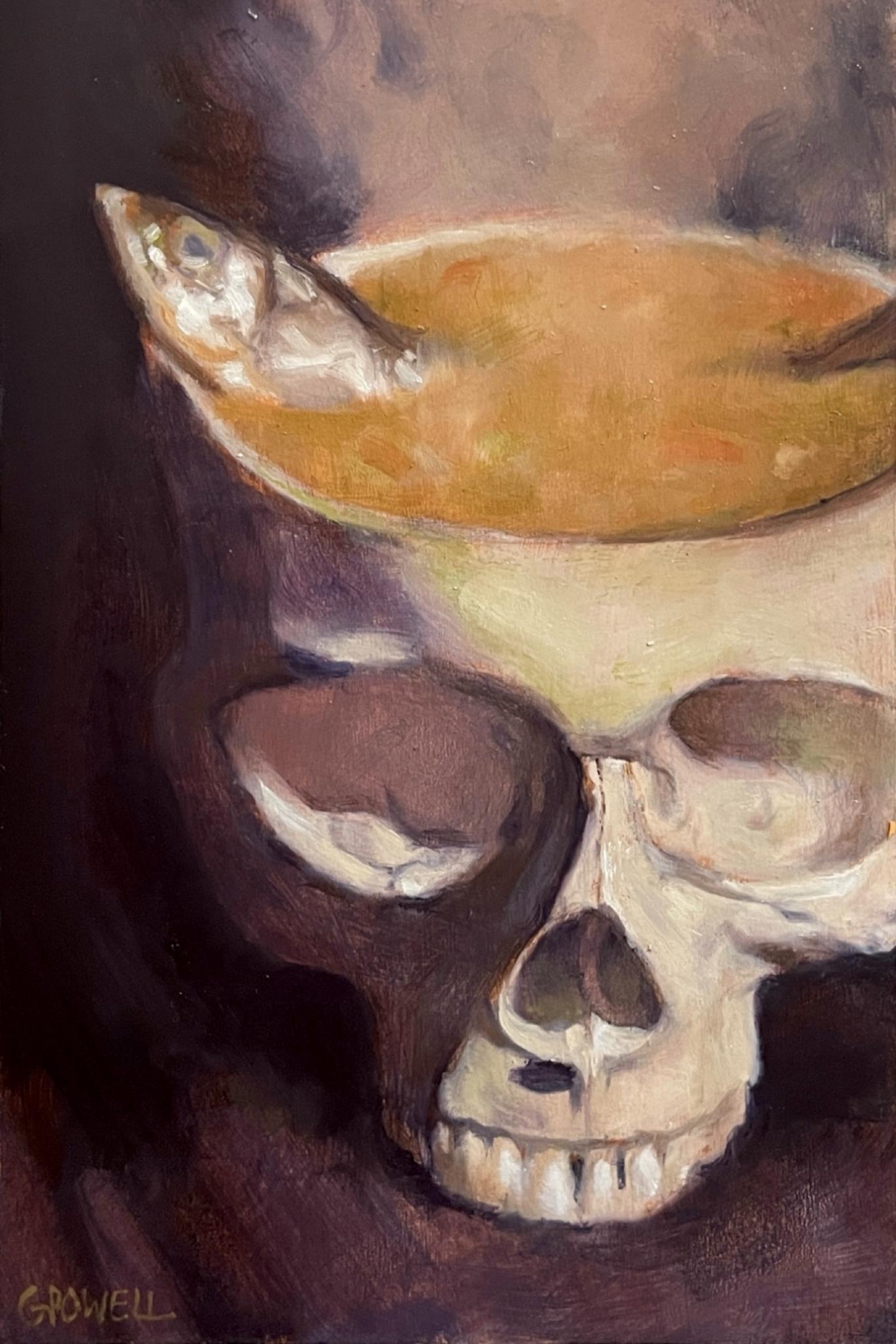Oil painting of a skull close up. The skull is open like a bowl and holding hot, steaming soup. A fresh fish sits in the soup. The color palette is mostly purples and orange.
