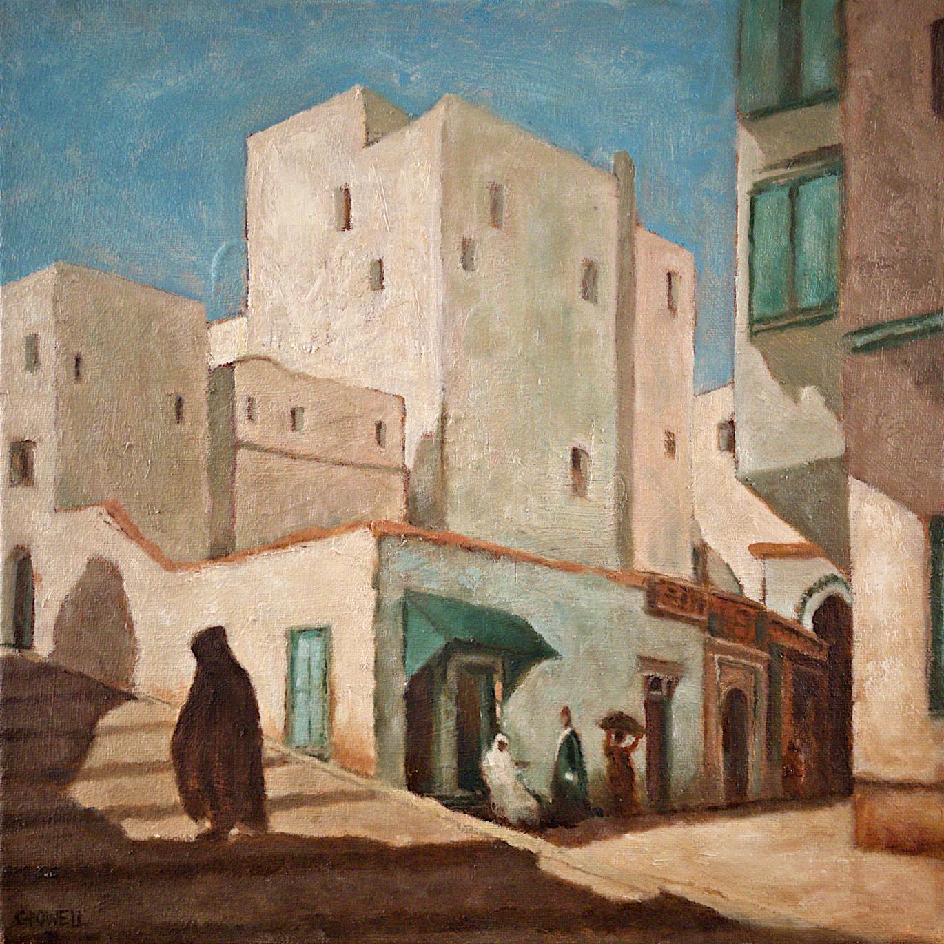 A cloaked man ascends a steep road in the warm afternoon light in front of Moroccan buildings bathed in light. A small group of figures look on from a short distance, relaxing in the shade. The color scheme is warm, with beige, brown, blue-greens and light blue.