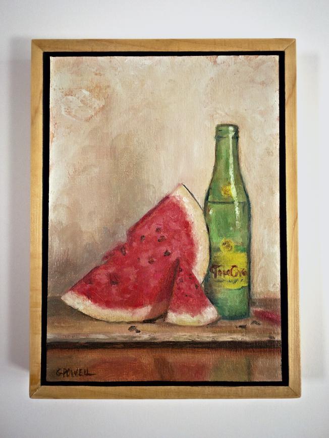 Small oil painting still life. A slice of watermelon leans against a full green bottle of Topo Chico sparkling water. Painted with fairly loose brushwork.